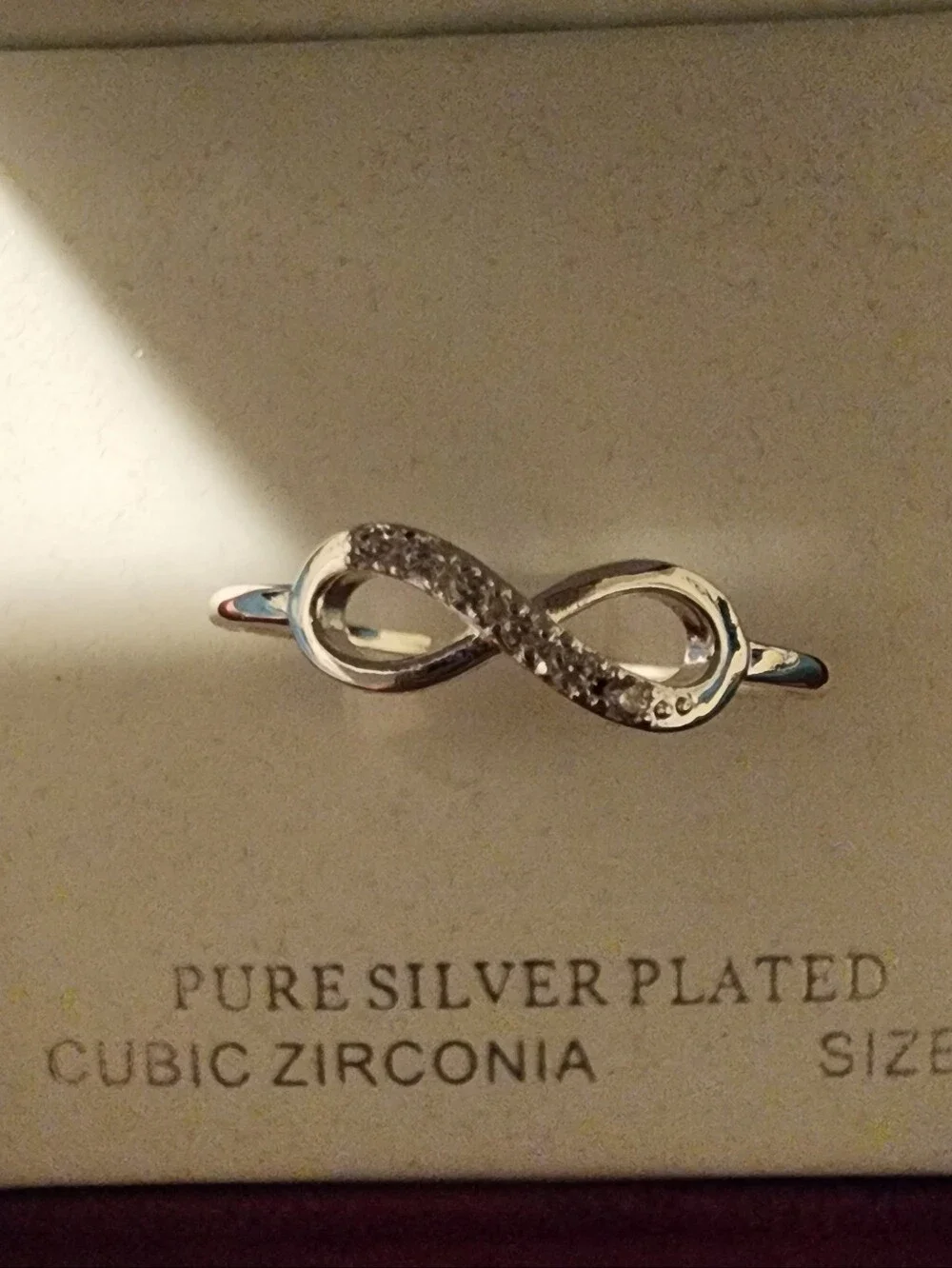 Sterling Silverplated  Infinity Ring with Clear Cubic Zirconia - Silver